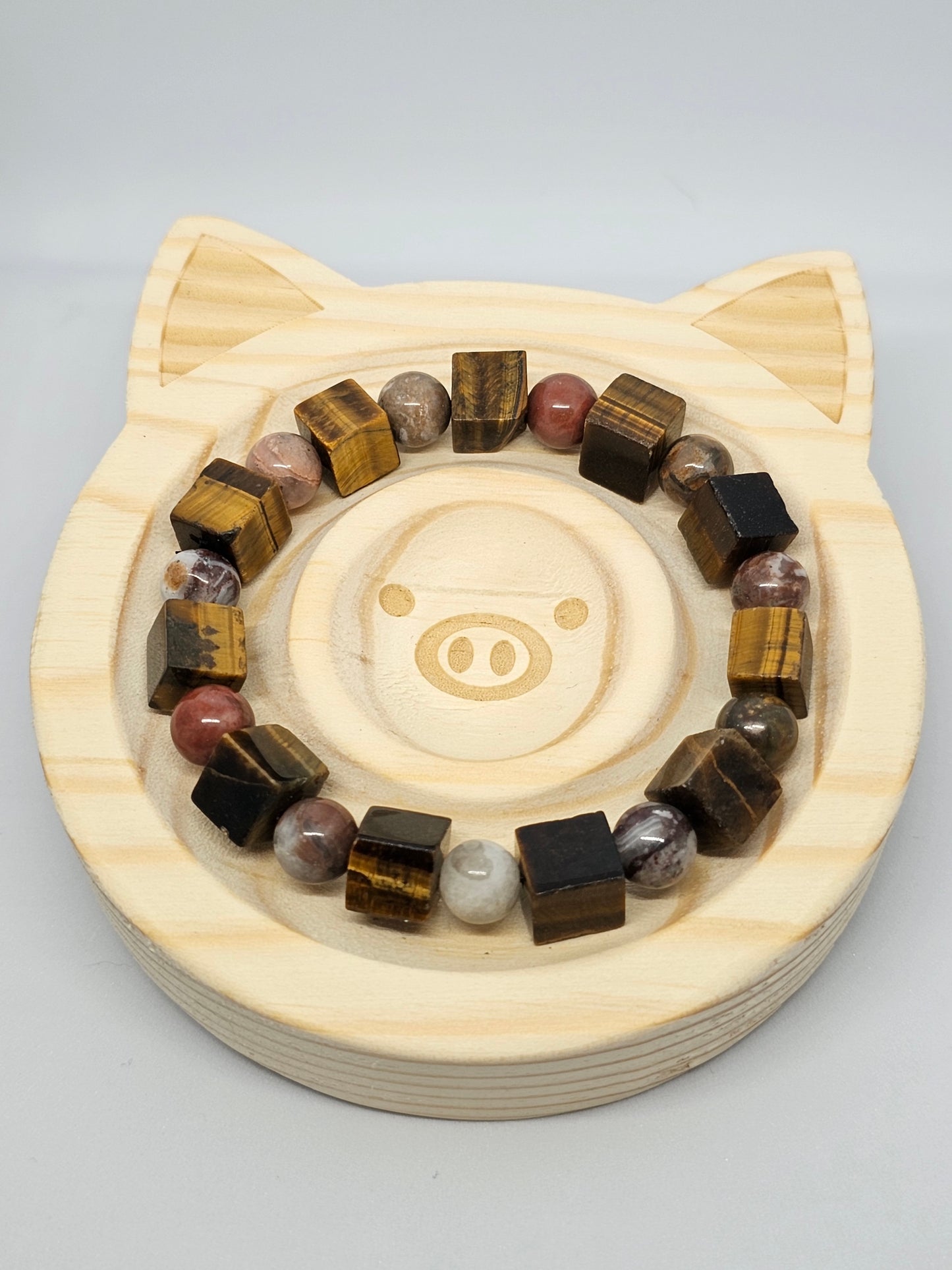 6.5" bracelet with a mix of cube and round crystal beads. Tiger Eye Cube & Polychrome Jasper.