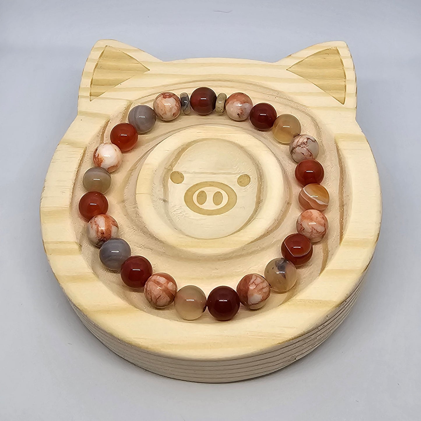 7" Bracelet with 8 mm crystal beads. Carnelian, Red Network & Yellow Botswana Agate.