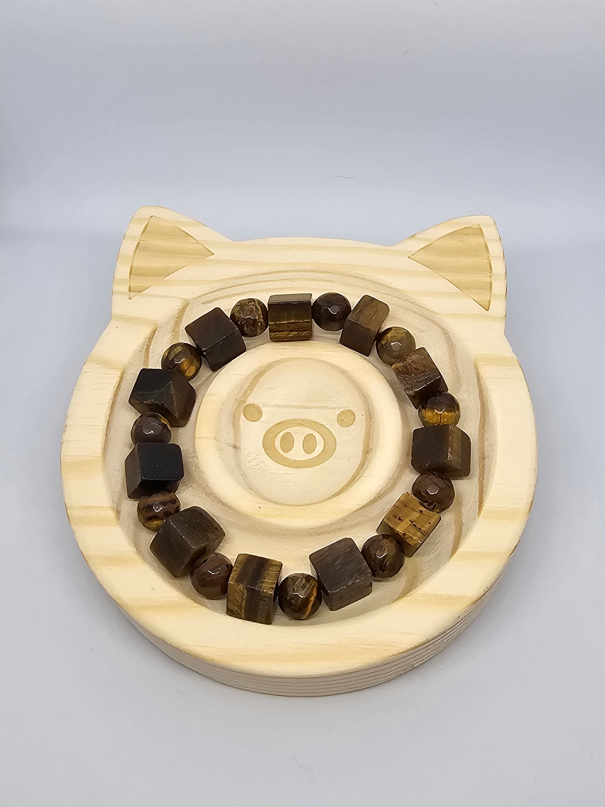 6.5" bracelet with Yellow Tiger's Eye cube and faceted round crystal beads.